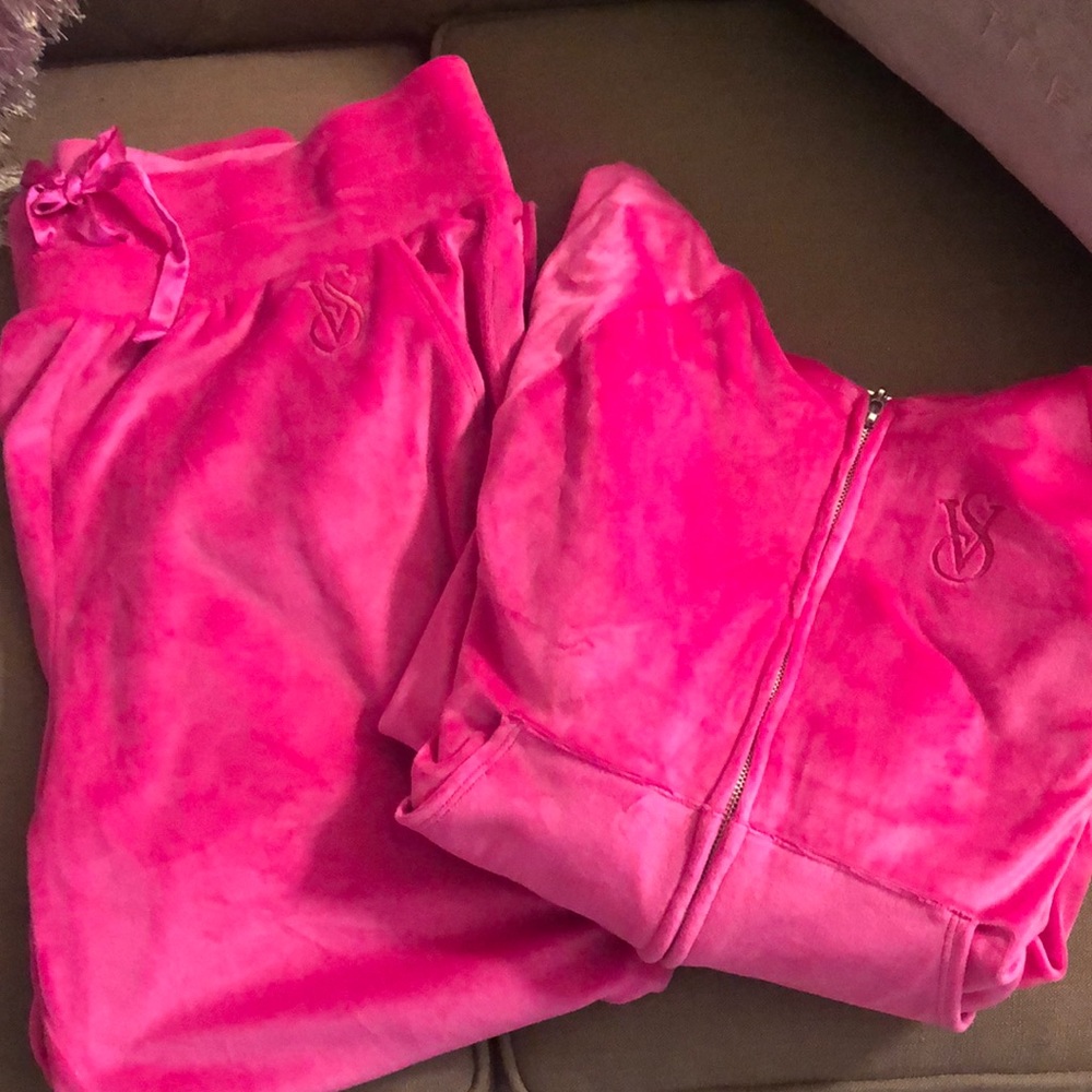 Pink velour jogging suit. Thick velour. Side pockets on pants. Inseam 29”.